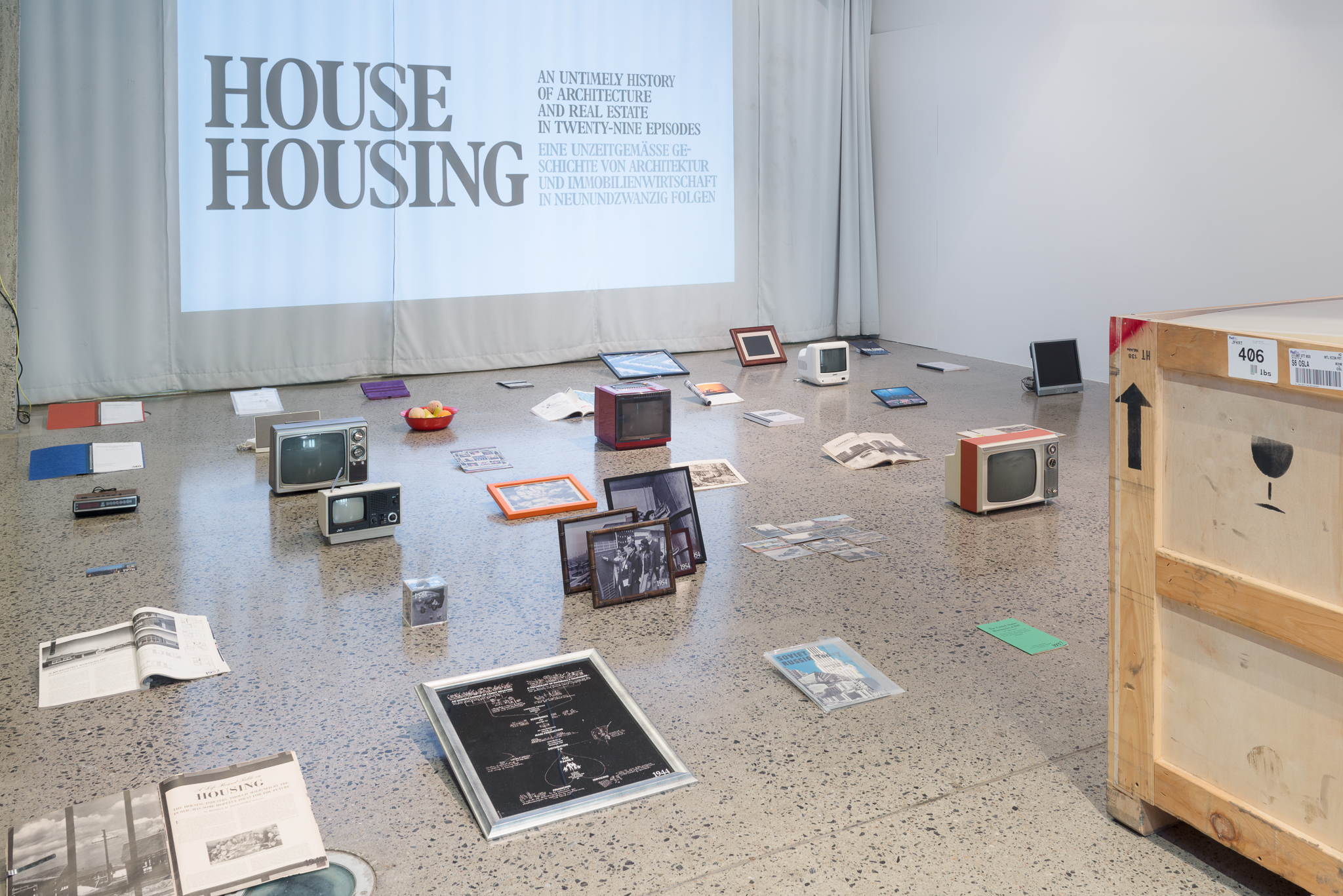Exhibition of objects scattered along the floor
