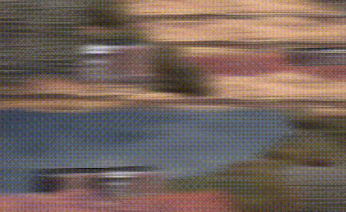 Shifting, blurred blobs of steely blue, earthy pink, sandy yellow, and muddied green float on top of one another 