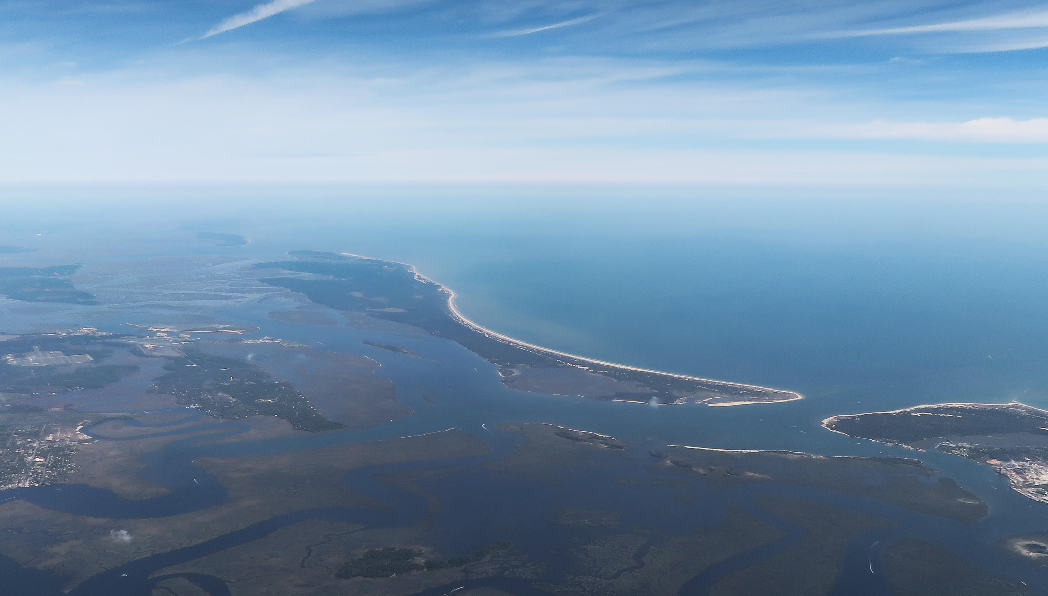 An aerial photograph showing islands off a coast