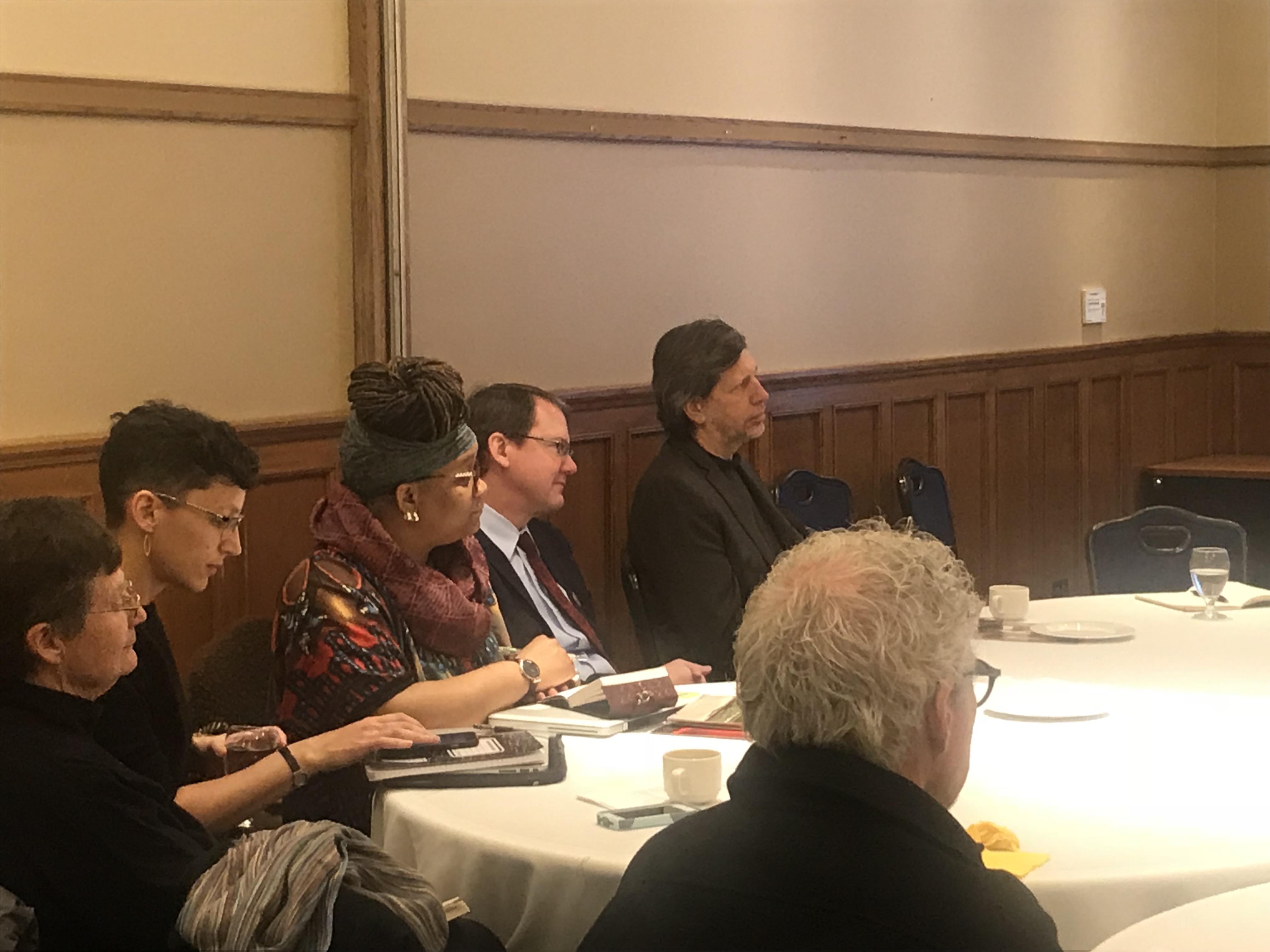 People listening attentively at the table